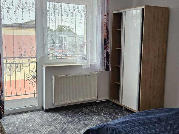 Pokoje Gościnne i Apartamenty