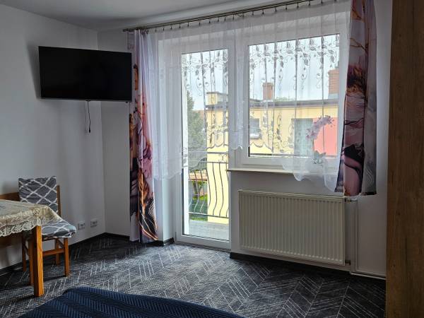 Pokoje Gościnne i Apartamenty