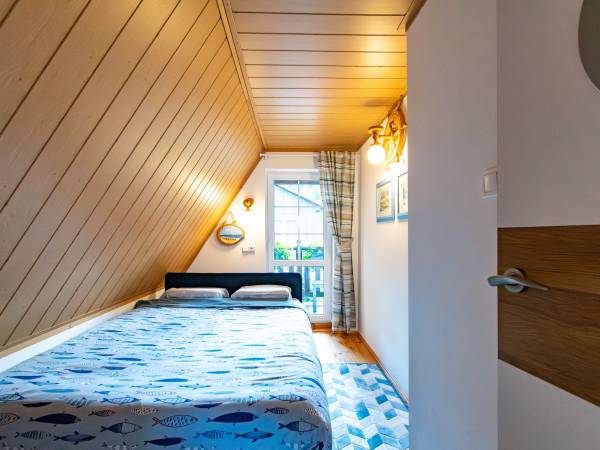 Sypialnia z dużym łóżkiem i super materacem