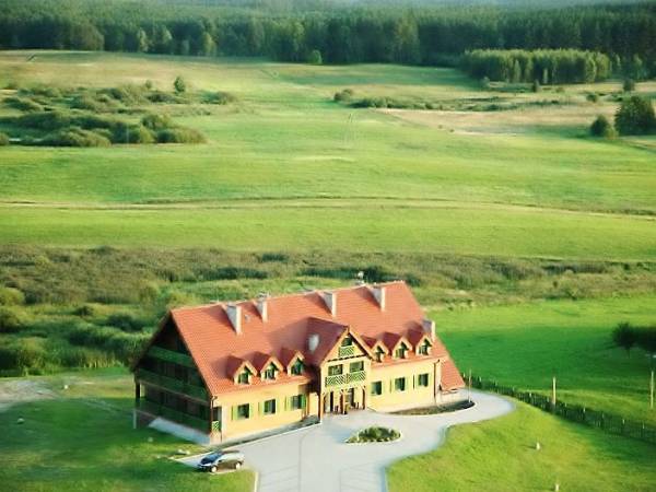 Kameralny hotelik Mazurska Chata położony wśród natury, 10 min. od centrum, 7 min. od plaży i 6 min. od parku wodnego Tropicana