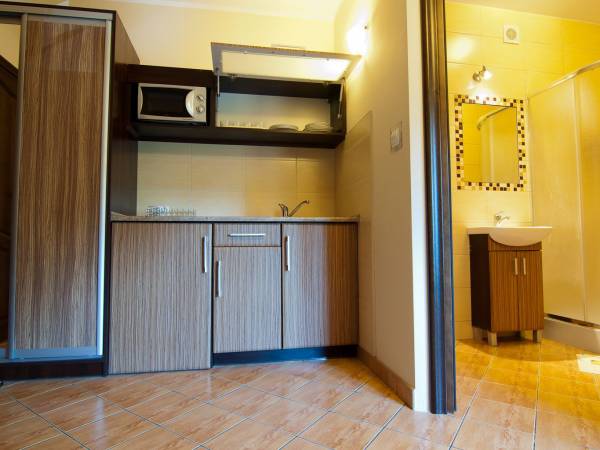 Gajówka - Całoroczne Pokoje i Apartamenty