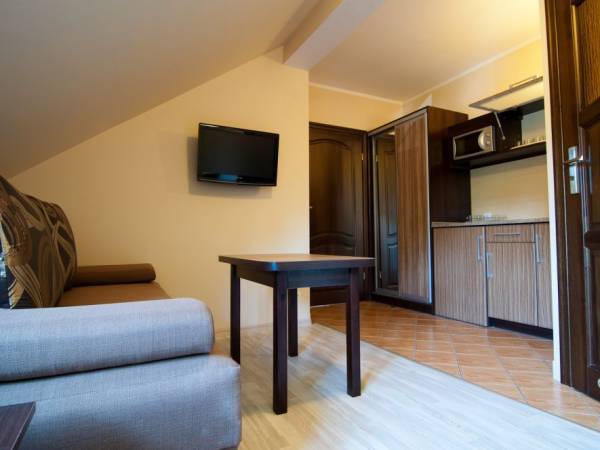 Gajówka - Całoroczne Pokoje i Apartamenty