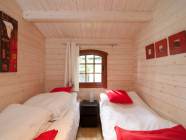 Sypialnia domek z bali mały.