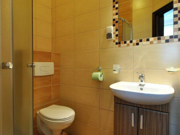 Gajówka - Całoroczne Pokoje i Apartamenty