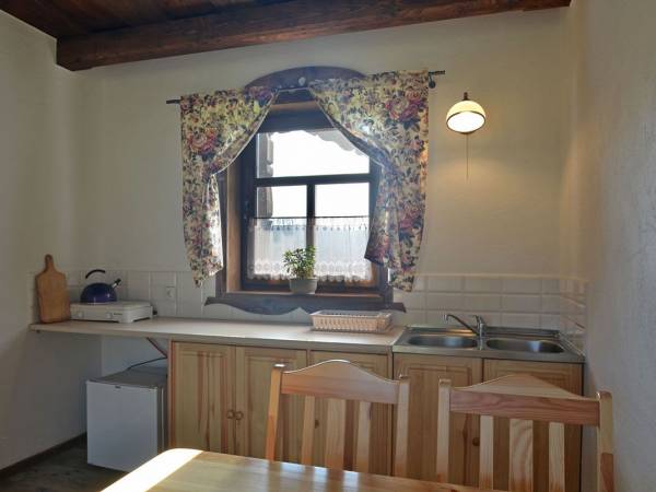 Cześć kuchenna w pokoju gościnnym