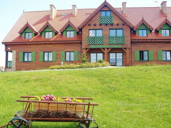 Kameralny hotelik Mazurska Chata położony wśród natury, 10 min. od centrum, 7 min. od plaży i 6 min. od parku wodnego Tropicana