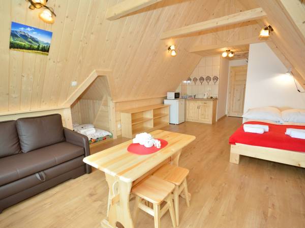 Może w nim zamieszkać 2-6 osób.