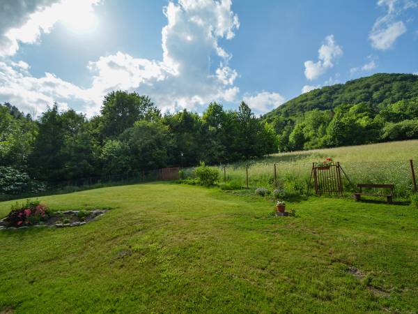 Za domem (miejsce postojowe)