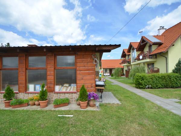 Domki całoroczne z kominkami i sauną i Apartamenty Grześ/Promyk Edenu