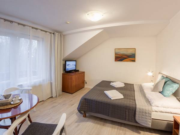 Apartament 2-pokojowy 4-osobowy z dwiema sypialniami.