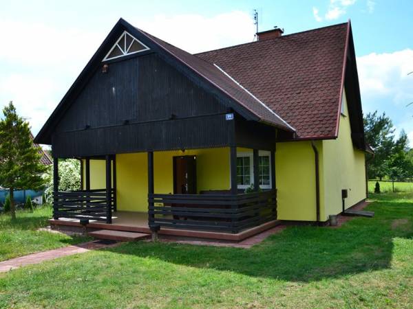 Całoroczny dom nad jeziorem z ogrodzoną posesją w sercu Mazur