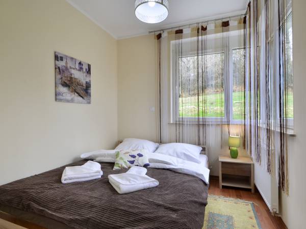 Apartament z widokiem na las