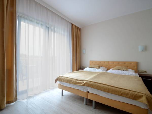 sypialnia w apartamencie 2 pokojowym