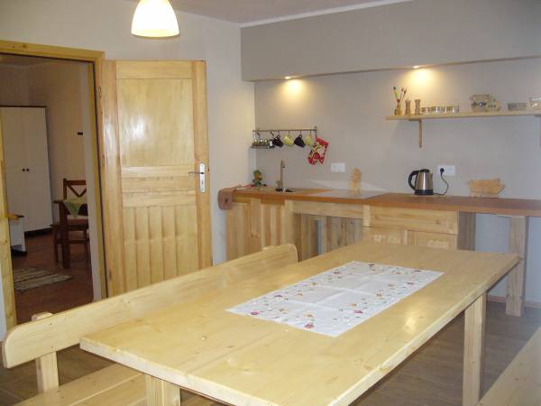 kuchnia w tle pokój 2-osobowy na parterze