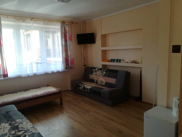 Pokoje Gościnne i Apartament "Przy lesie"