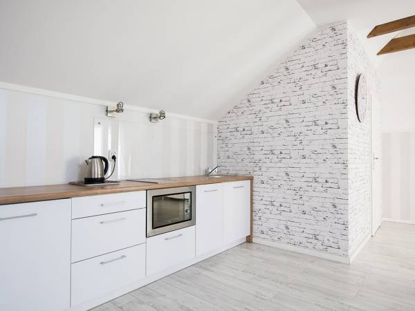 Apartament A - bogato wyposażona kuchnia.