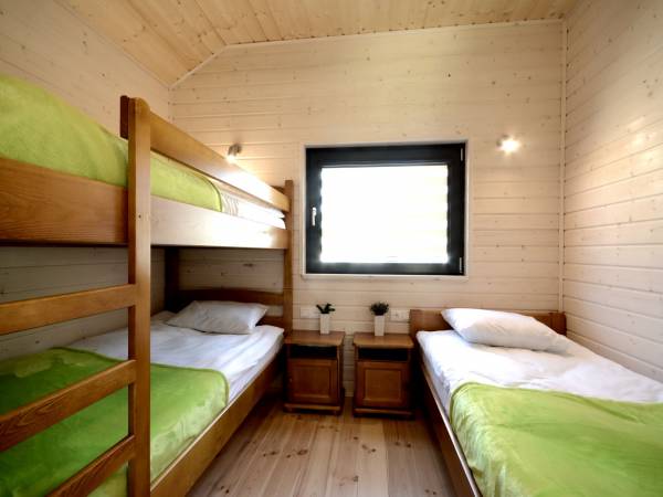 Myśliwska 30 Sypialnia w domku 7 os.