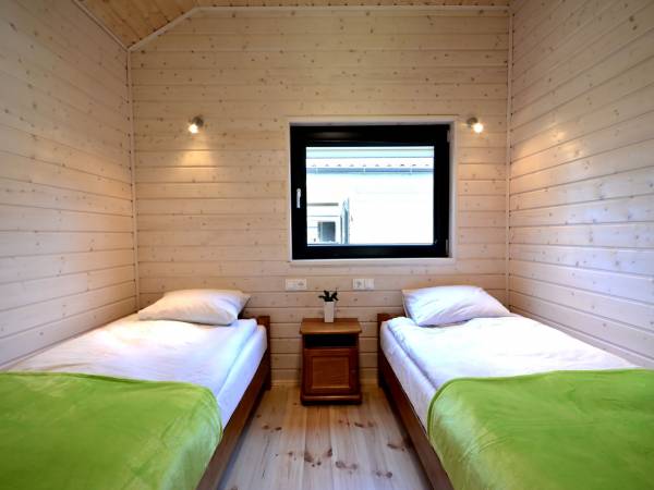 Myśliwska 30 Sypialnia w domku 4-6 os.