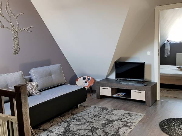 Bawialnia / salon na górnym poziomie