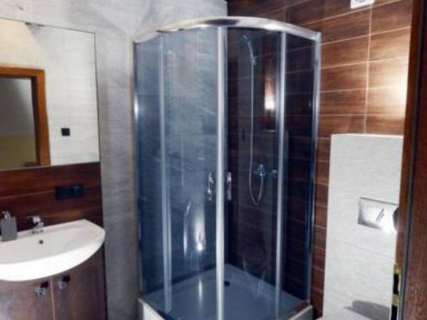 Łazienka w apartamencie Luksusowy i stylowy.