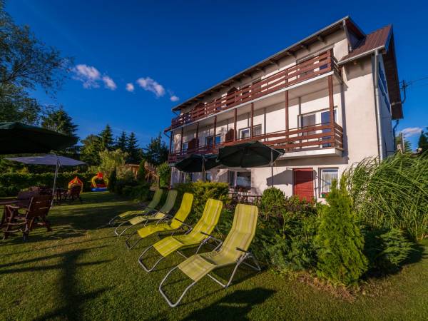 Apartamenty i Pokoje nad brzegiem jeziora Tałty