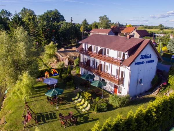 Apartamenty i Pokoje nad brzegiem jeziora Tałty