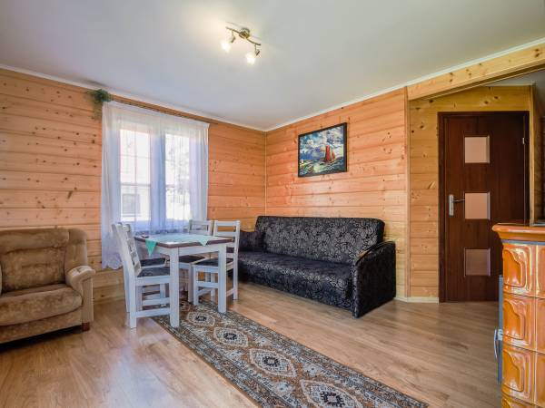 Domki całoroczne z kominkami i sauną i Apartamenty Grześ/Promyk Edenu