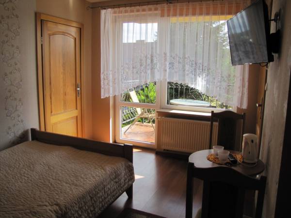 Sypialnia w pokju typu studio