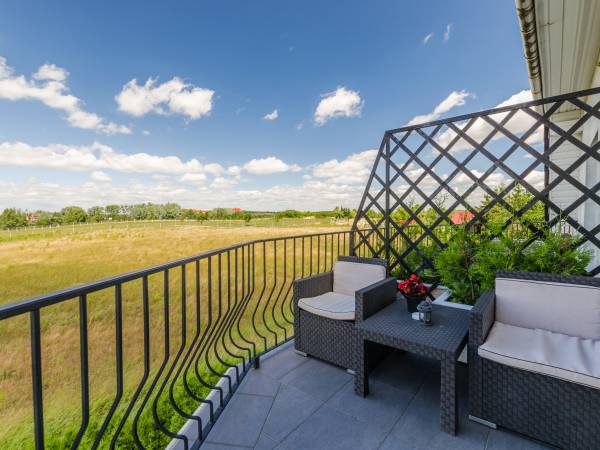 Pokój 4-osobowy z łózkiem "Queen-size" lub 2 pojednyczymi i rozkładaną kanapą, balkonem, L